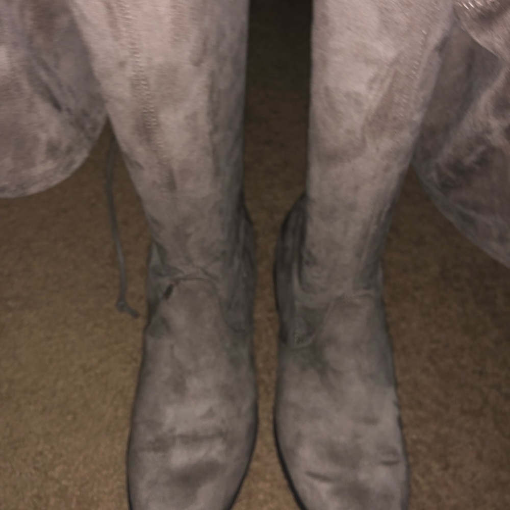 Like new,over the knee boot! Worn once. Tie behind the knee.12M -color in pick